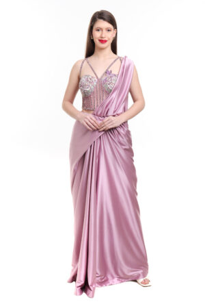 Mauve pre draped saree with embroidered corset blouse